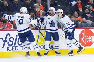 Laughton scores in return to Philly, and Maple Leafs top Flyers 2-1 on Cowan's goal in OT