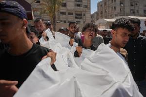 Israeli strike hits a tent in central Gaza, killing 3, including a child