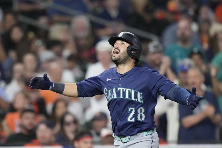 Suárez homers and Woo exits after 5 innings as Mariners beat Astros 4-0 to take over 1st in AL West