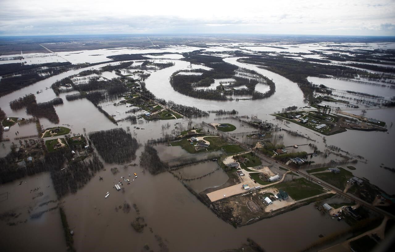 Manitoba premier tours flood zones by air but more areas hit with