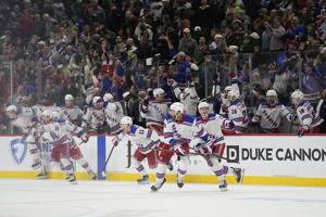 Braden Schneider scores in overtime to give the Rangers a 3-2 victory over the Wild