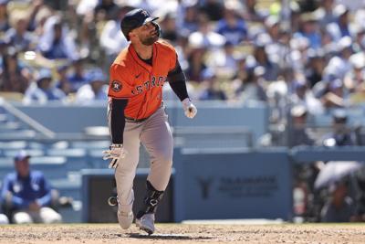 Astros first baseman Christian Walker is on paternity leave; Kenedy Corona recalled