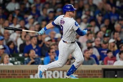 Alvarez hits 2-run homer in 8th as Mets rally to beat Cubs 9-7