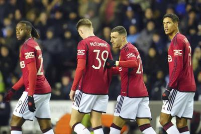 Man United beats 3rd-tier Wigan 2-0 to ease through to 4th round of FA Cup
