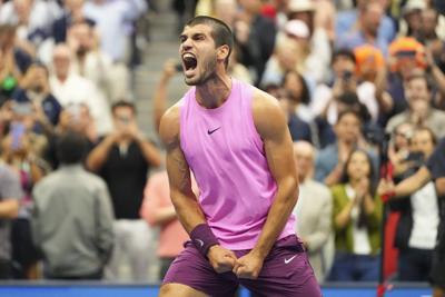 Photo highlights from the US Open as Carlos Alcaraz overpowers Jannik Sinner