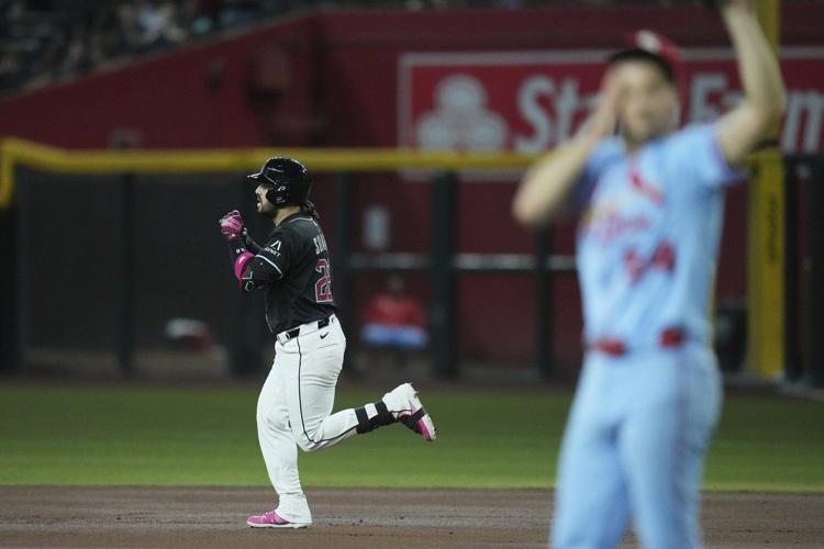 Suarez hits 32nd and 33rd homers as Diamondbacks rout Cardinals 10-1