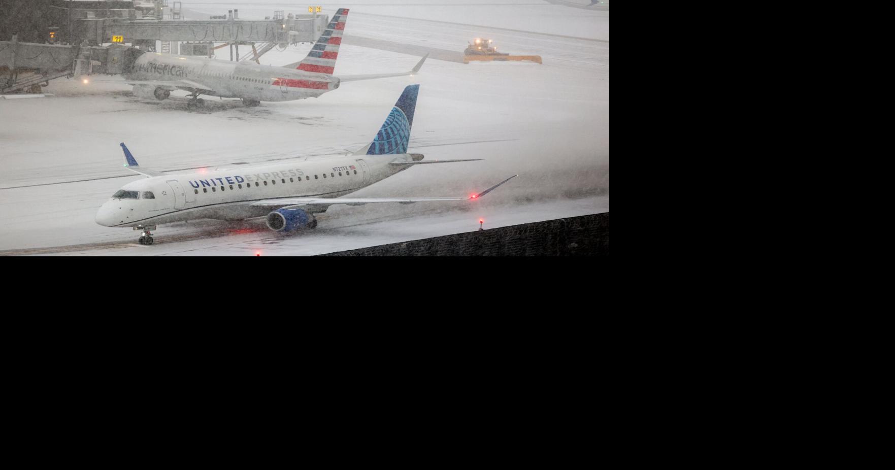More than 14,000 flights canceled as massive winter storm sweeps across U.S.