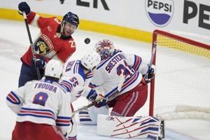 Reinhart scores in OT, Panthers beat Rangers 3-2 to tie East final