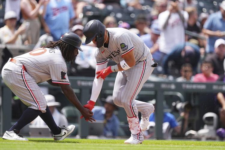 Lewis hits 2 homers and Ryan strikes out 11 as Twins top Rockies to avert series sweep