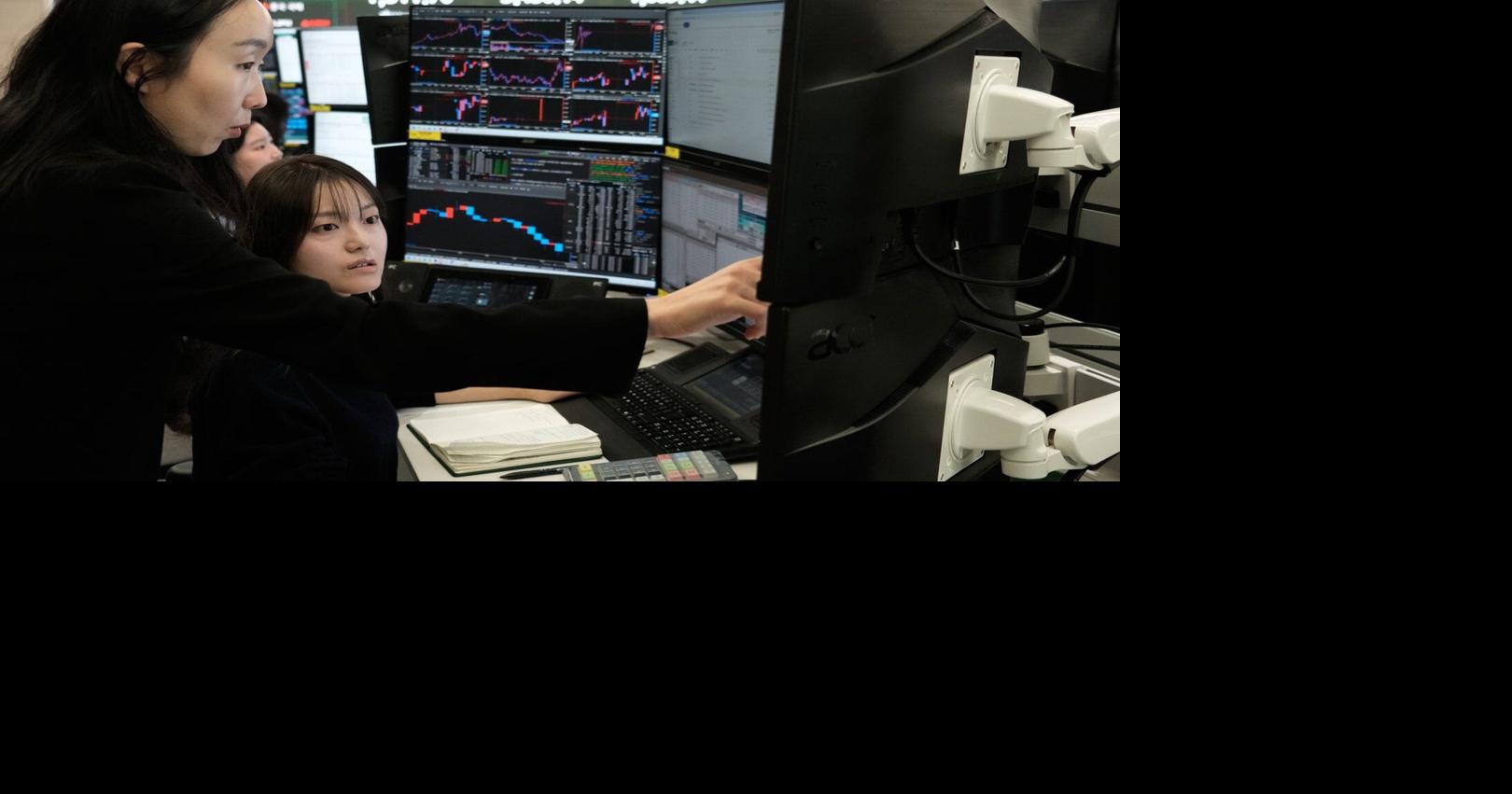 Asian shares mostly gain while oil prices keep rising