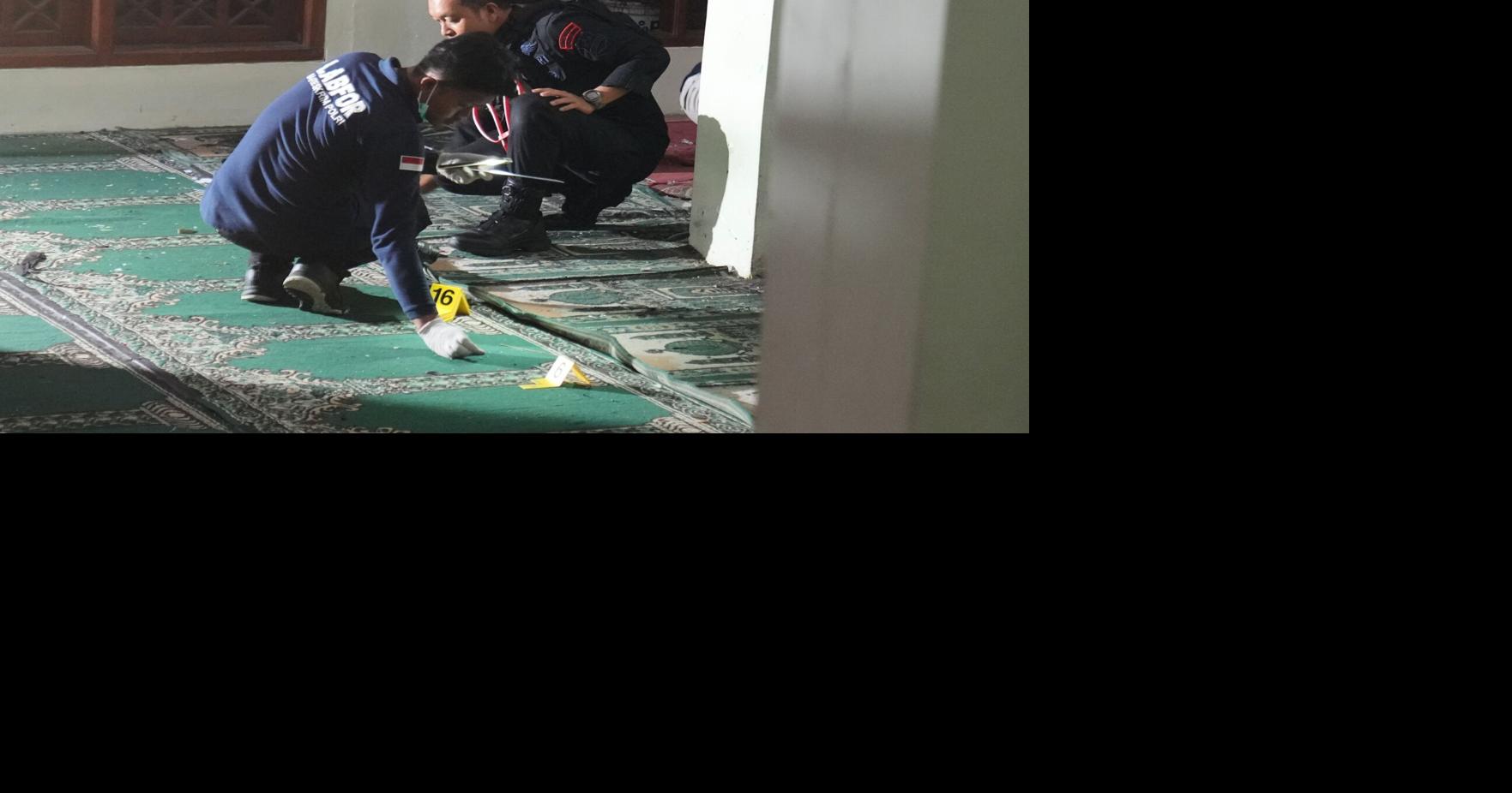 Multiple explosions shake a mosque in an Indonesian high school and injure 54