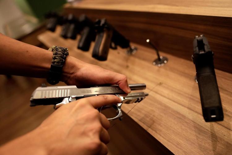Brazil’s Bolsonaro moves to arm base, alarming gun experts
