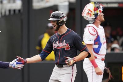 White goes deep twice as the Braves beat the Reds in rain-delayed MLB Speedway Classic at Bristol