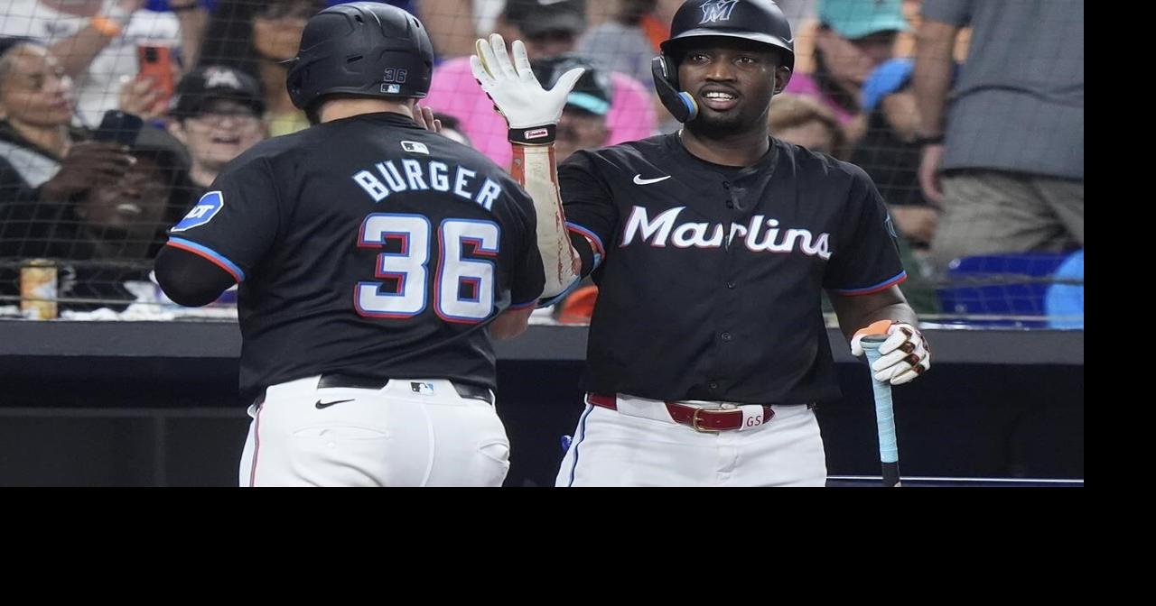 Jake Burger homers and doubles in the Marlins' 6-4 victory over the Mets