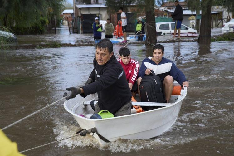 AP PHOTOS: Heavy rainfall floods Argentine highways, forces evacuations