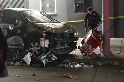 Authorities investigating LA shooting and crash that injured dozens ask for tips to find gunman