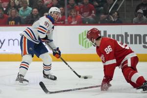 Nurse scores in OT and Oilers top Red Wings 3-2 to tie franchise record