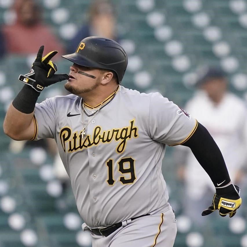 Pittsburgh Pirates center fielder Bryan Reynolds (10) dives for a blooper  single in the second inning of a MLB spring training baseball game against  the New York Yankees in Bradenton, Fla., Thursday