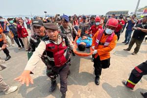Indonesian divers recover 3 bodies from capsized ferry as salvage operation begins