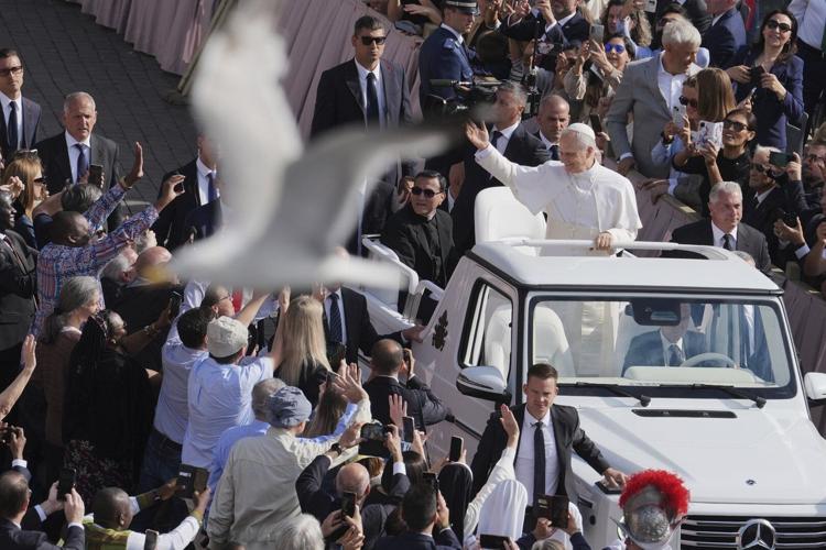 AP PHOTOS: Pope Leo XIV takes his first popemobile ride in St. Peter's Square ahead of installation