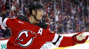 Dumoulin scores OT winner to give Devils 5-4 win over Bruins.