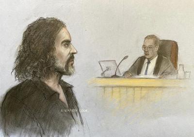 Russell Brand granted conditional bail after appearing in London court on rape and assault charges