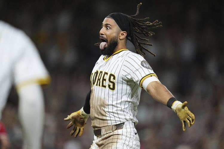 Fernando Tatis Jr.'s 10th-inning sacrifice fly lifts the Padres to a 4-3 win over the Reds
