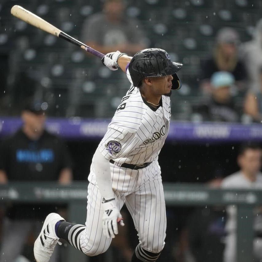 Tovar's single in storm lifts Rockies over Marlins 7-6 after blown