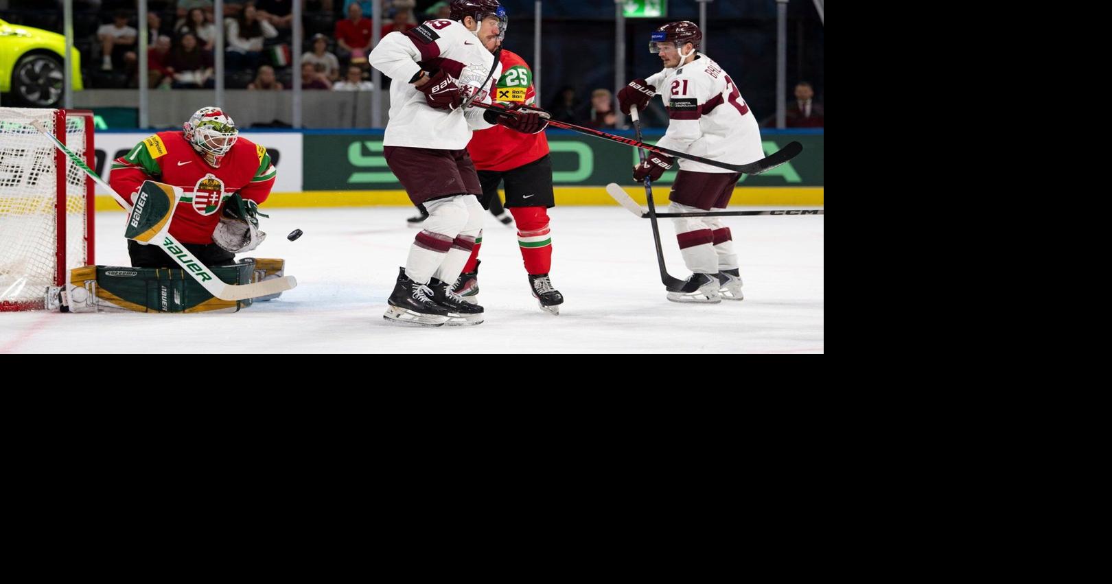 Latvia routs Hungary 8-1 to reach quarterfinals at ice hockey worlds