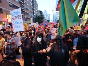 First Up: Carney's summit drew hundreds of investors and hundreds more protestors