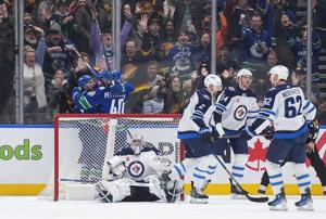 Boeser scores two, Vancouver Canucks pull off 6-2 upset of NHL-leading Winnipeg Jets