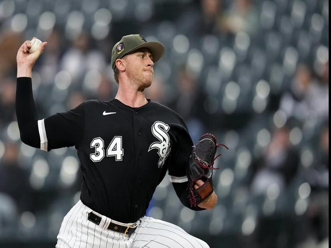 Kansas City Royals starting pitcher Zack Greinke winds up during the first  inning of the team's baseball game against the Chicago White Sox on Friday,  May 19, 2023, in Chicago. (AP Photo/Charles