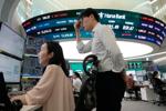 Asian markets retreat after rebounding AI stocks send the S&P 500 to brink of a new record