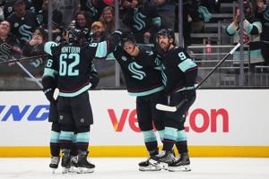 Marchment scores in Seattle debut as Kraken win season opener for first time