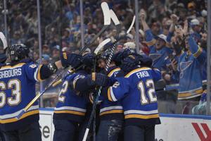 Broberg scores in OT to lift Blues over Canucks 4-3 for 4th straight win