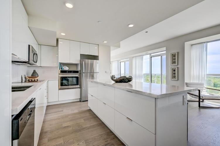 Image showcasing Light-filled, $1.88 million penthouse overlooks Toronto Hunt golf club ...