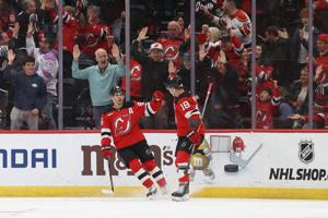 Jack Hughes scores in OT and Devils extend win streak to 8 with 4-3 victory over Avalanche