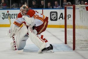 Calgary Flames list goalie Markstrom day-to-day with lower-body injury, recall Wolf