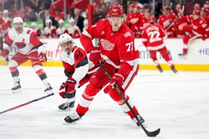 Copp scores in OT, lifts Red Wings to 4-3 win over Hurricanes after retiring Sergei Fedorov's jersey