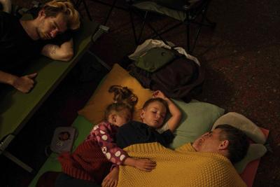 By day, the Ukrainian capital is alive and humming. By night, it’s a battleground