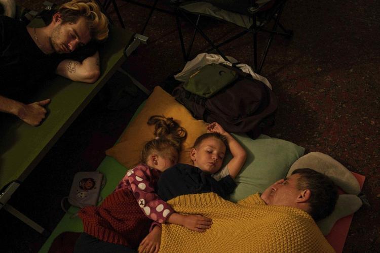 By day, the Ukrainian capital is alive and humming. By night, it’s a battleground