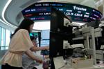 Asian shares are mixed after US stocks fall back while oil rebounds