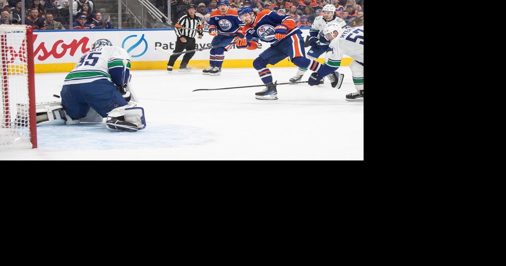Oilers net first win with 3-1 decision over resilient Canucks