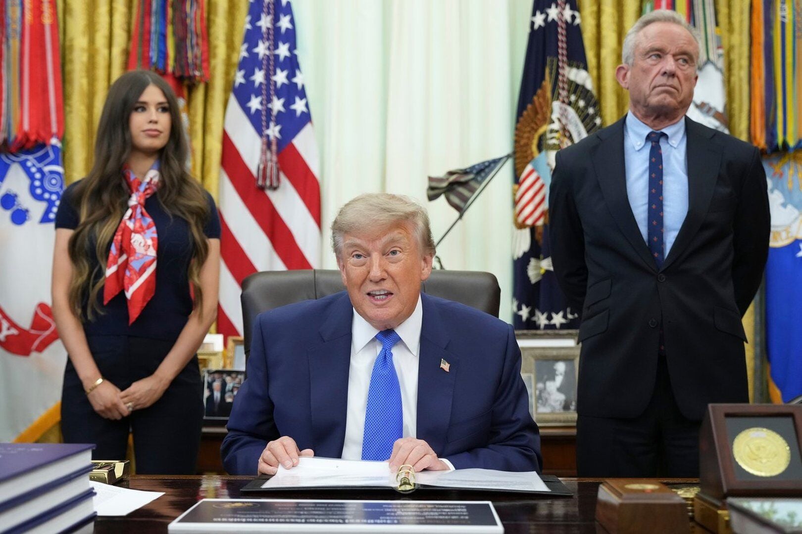 Trump signs executive order on childhood vaccines, directing plans to break up MMR shot and space out other shots; plan would require millions of individual doses last used decades ago