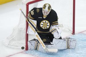 Bruins get 2 short-handed goals in 1st period, beat Canucks 4-0 in matchup of NHL’s top 2 teams