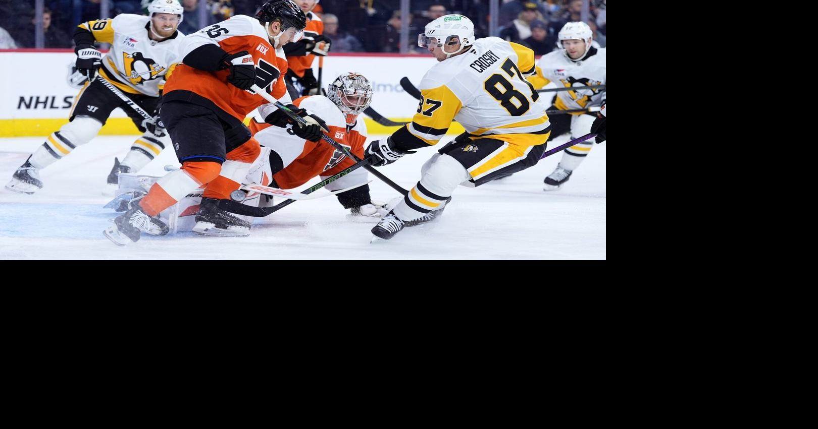 Sidney Crosby nears Mario Lemieux's Penguins points record with 2 goals against Flyers