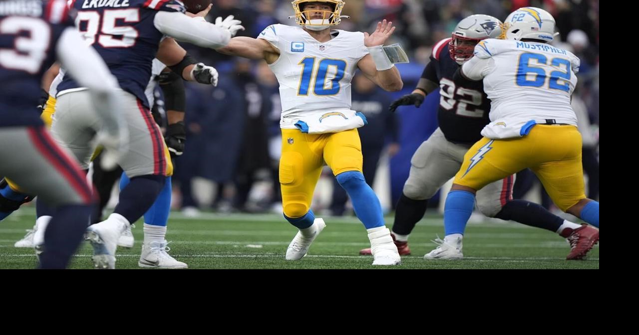 Herbert tosses 3 TD passes and Chargers secure a playoff spot with a 40-7 rout of Patriots