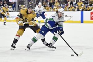 Vince Dunn's second goal comes in overtime as Kraken rally past Canucks 5-4