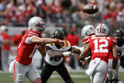 NCAA football scores: Julian Sayin sets completions mark and No. 1 Ohio  State rolls past Grambling State