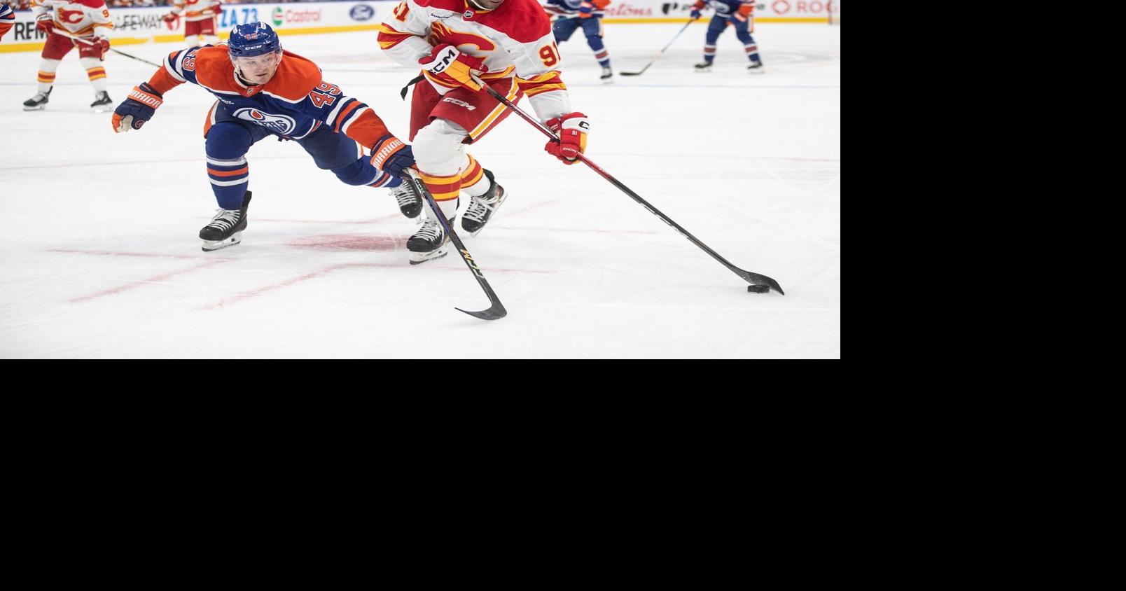 Kadri scores shootout winner, Flames rally for 4-3 season-opening win over Oilers